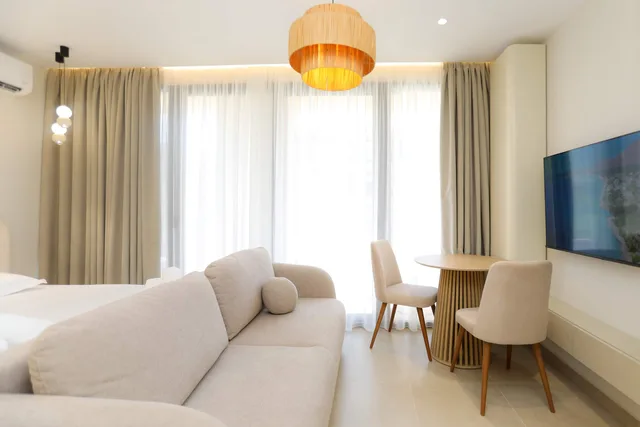 Sofa and table by the balcony door